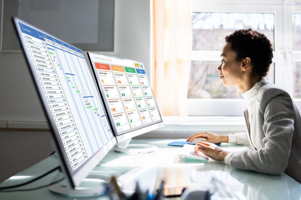 A woman looking at the schedule for security purposes after move from Google Workspaces to Microsoft 365